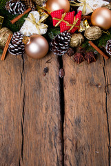 Fototapeta na wymiar Christmas decoration, balls on dark wooden background 