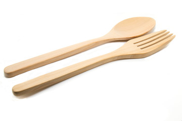 Wooden fork and wooded spoon on white background 