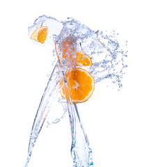 Fresh fruits, orange falling in water splash, isolated on white background