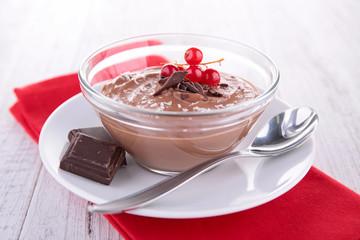 bowl with chocolate cream and berry