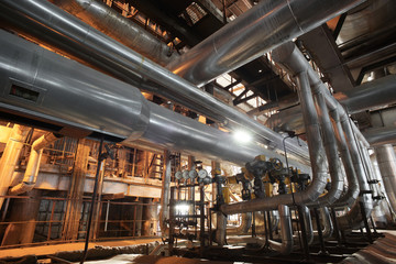 different size and shaped pipes and valves at a power plant