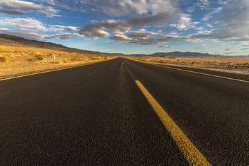 Fototapeta na wymiar Lonely highway in desert of California, USA
