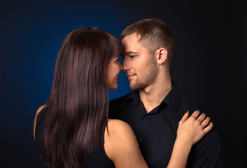  couple on dark background