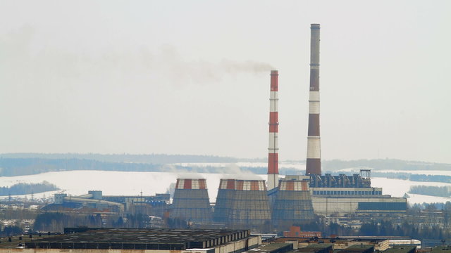4K Timelapse smoking power plant. Winter Russia