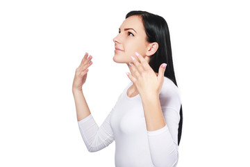 woman wafting air to nostrils