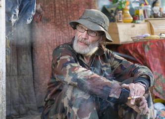 Fototapeta premium sad and bitter homeless man