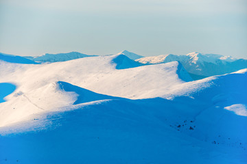 Sunset in winter mountains