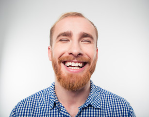 Obraz premium Closeup portrait of a casual man laughing