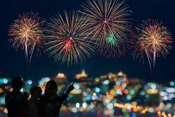 Fototapeta na wymiar Beautiful firework display for celebration with blur bokeh light