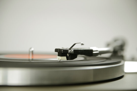 Vintage record player shot with wide aperture and focus on cartr