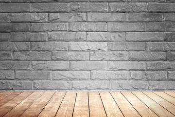 Blick brown wall background and wood shelf.