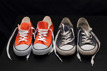 new orange and old blue sneakers - Powered by Adobe