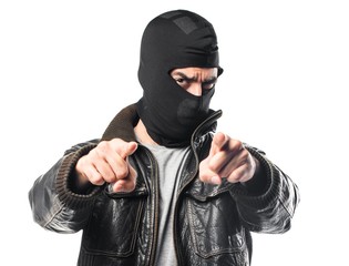 Robber pointing to the front