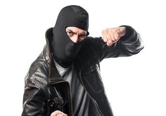 Robber giving a punch