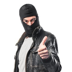 Robber with thumb up