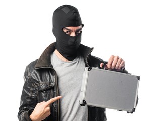 Robber holding a briefcase
