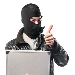 Robber holding a briefcase