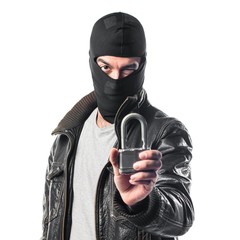 Robber holding vintage padlock