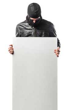 Robber holding an empty placard