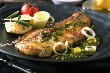 Grilled fish with lemon and rosemary