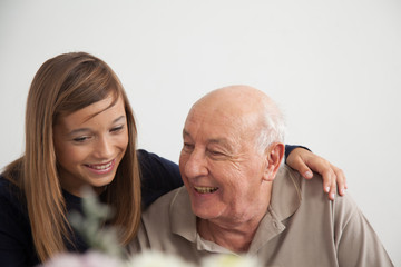 girl having fun with her grandfather
