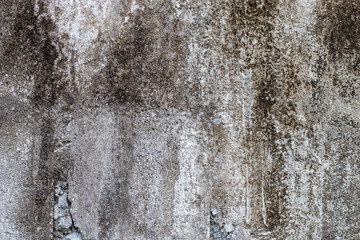 old, white and black brick wall