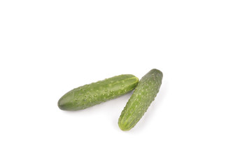 green cucumbers on white background