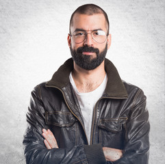 Fototapeta premium Man with leather jacket with his arms crossed