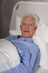 Old man alone in hospice