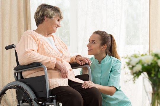 Elderly woman on wheelchair