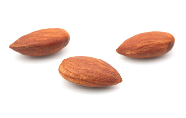 Almond nuts on the white background