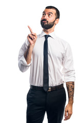 Businessman pointing up