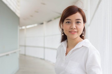 Portrait of thai adult businesswoman beautiful girl relax and smile.
