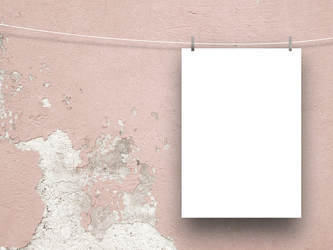 Single Hanged Paper Sheet Frame On The Right With Clothes Pin On Pink Cracked And Scratched Plastered Concrete Wall Background