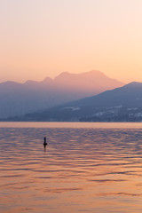 Sunset at lake Attersee, Salzkammergut, Austria with Schafberg Mountain