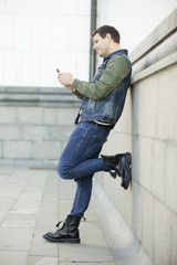 Handsome Man Using Mobile Phone Outdoor