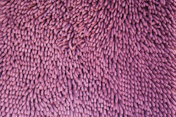 Purple foot scraper texture background.