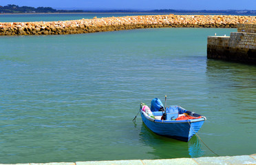 Motor boat on the Bensafrim river in Lagos harbour