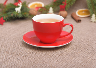 Red cup in the Christmas decor.