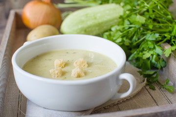 Zucchini soup with onion, garlic and potatoes