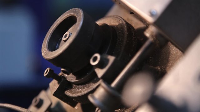 Oiled roller spins in machine tool of rolling mill