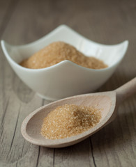 cane brown sugar in white bowl
