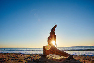 Fototapeta na wymiar young woman doing yoga