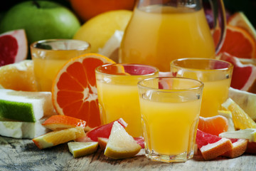 Naklejka na ściany i meble Citrus juice from oranges, tangerines, grapefruits, lemons, appl