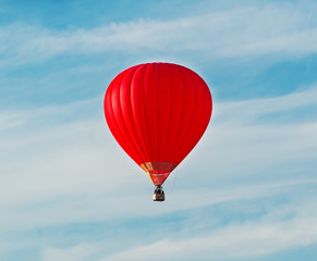 The red balloon floats in heavens
