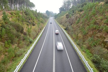 blurred image of a car in motion on the highway