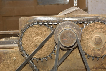 carpenter working with plane on wooden