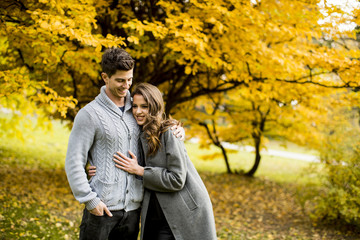 Young couple in the autumn park