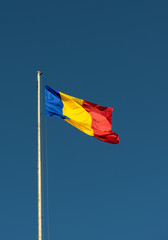 Flag of Romania on a blue Sky