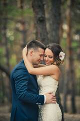 Fototapeta premium Cute beautiful happy just married couple